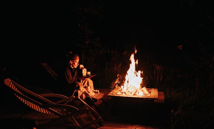 There is nothing quite like an open fire especially with a hot toddy.  This was taken in September outside our new Bell Tents afectionately known as B